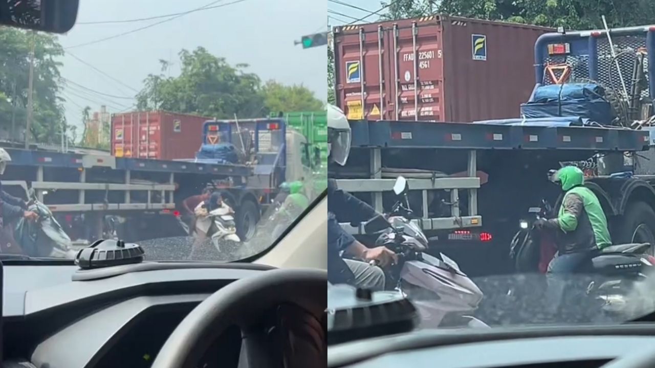 Jalanan Macet, Para Pemotor Nekat Cari Celah di Sela Truk Kontainer yang Berhenti Jalanan Macet, Para Pemotor Nekat Cari Celah di Sela Truk Kontainer yang Berhenti
